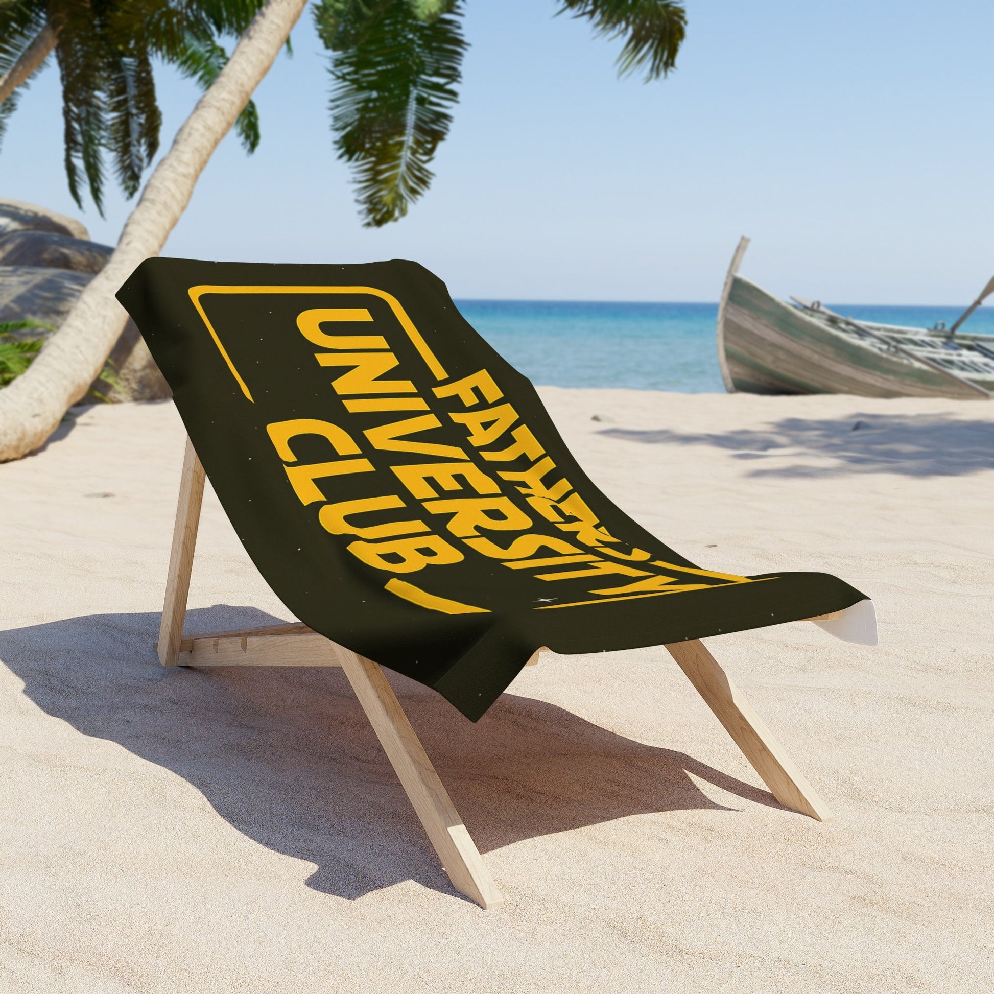 Father’s University Beach Towel on chair by the ocean.